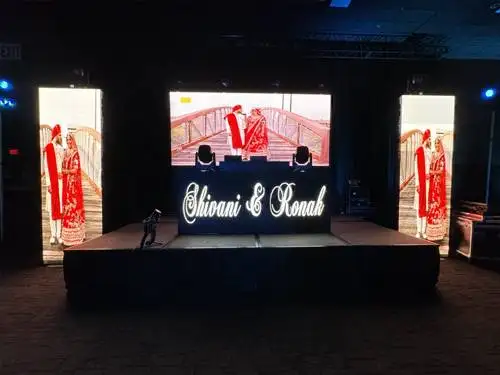 DJ booth and entertainment lighting at a private event by Prime AV