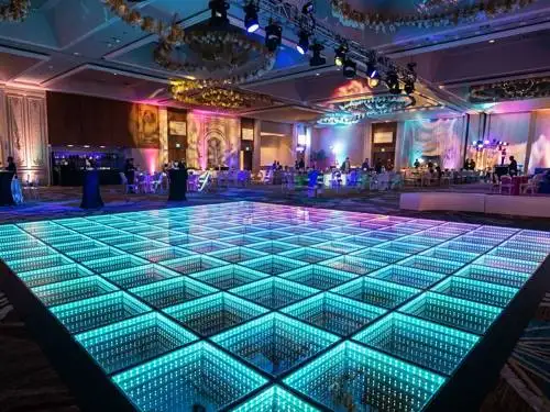Lit dance floor at a private celebration by Prime AV