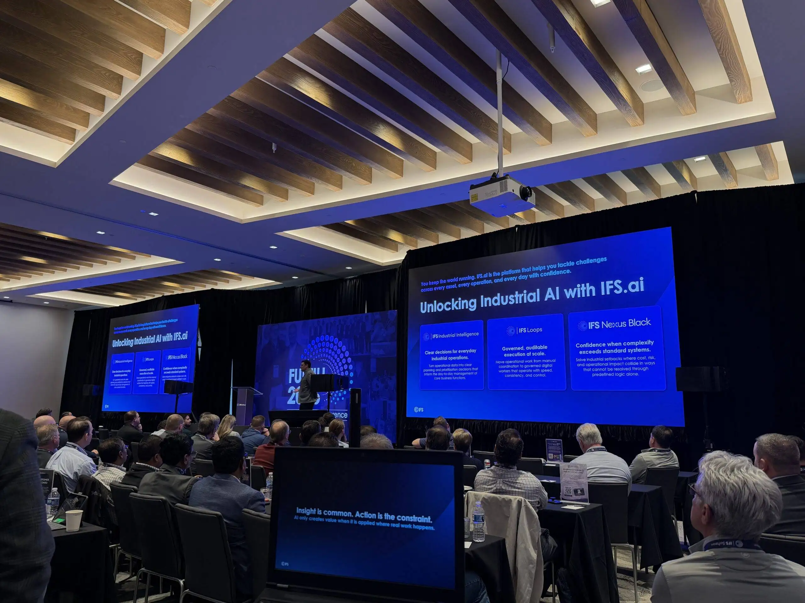 Large LED video wall on a conference stage produced by Prime AV