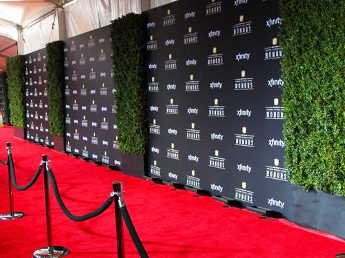 Red carpet and step-and-repeat entrance with lighting by Prime AV