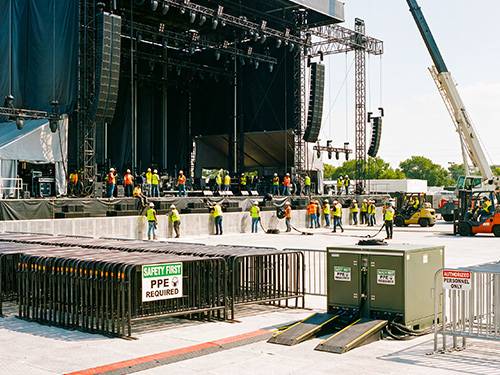 Prime AV technicians rigging and cabling safely using proper safety practices at an event
